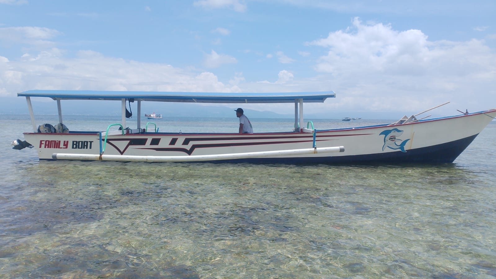 Small traditional lepe-lepe boat in Manado